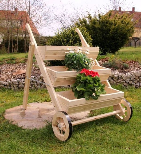 Decoration with DIY wooden pots and flower boxes that giving the garden ...